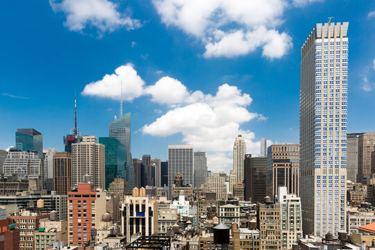 Manhattan Skyline with High Rise Buildings Under Blue Sky