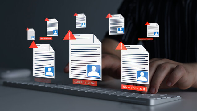 Personal data employee hacking concept with cybercriminal accessing confidential documents, digital files and sensitive information during online security breach and identity theft attack.	
