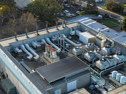 Wantirna South, Victoria, Australia - 03 September 2026: Aerial view of the Knox Data Centre roof featuring industrial HVAC cooling towers and ventilation systems.