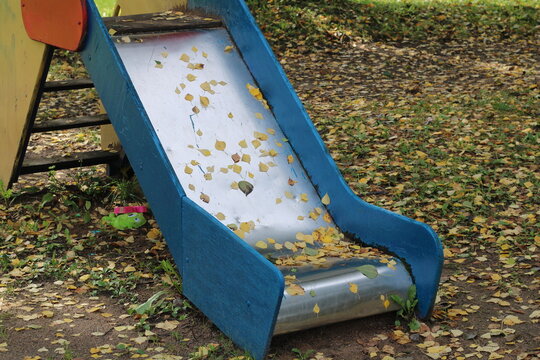 yellow leaves on the children's slide, large,