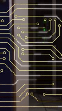Animation of circuit board pattern over hardware and illuminated data server rack in server room
