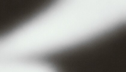 Fototapeta premium Abstract grainy black and white background with diagonal gradient light streak, retro film noise texture and dramatic monochrome aesthetic
