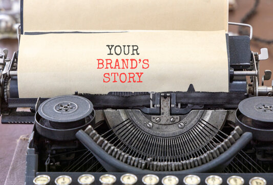 Branding and your brands story symbol. Concept words Your brands story typed on beautiful old retro typewriter. Beautiful white background. Business branding your brands story concept. Copy space.