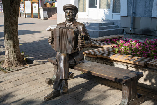 ELETS, RUSSIA - JULY 03, 2026: Sculpture &ldquo;Harmonist with a Yelets accordion&rdquo;. Historical center of Yelets, Lipetsk region