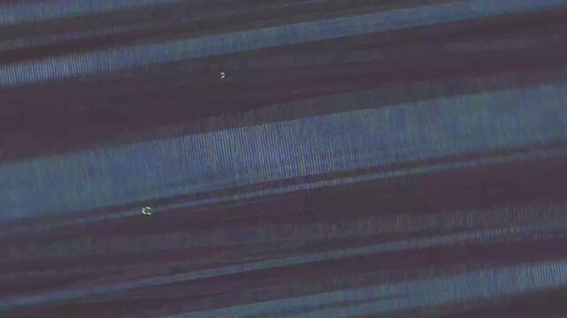 Dynamic colorful glitch transition with digital distortion, RGB split and vibrant color noise. Perfect overlay for modern video editing and intros.