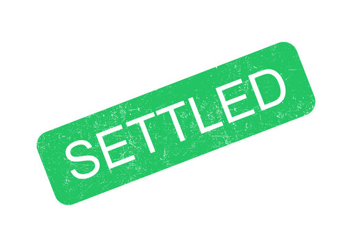 Green settled stamp with bold white text on clean background