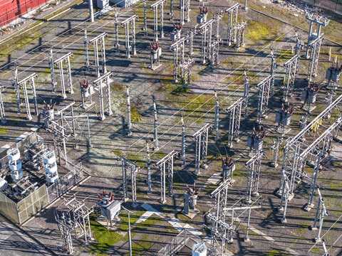 Bayswater North, Australia - 29 August 2026: Aerial view of Bayswater Zone Substation featuring electrical transformers, metal pylons, and power lines in a fenced industrial area.