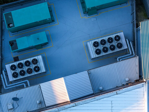 Kilsyth South, Australia - 29 August 2026: Aerial view of the Micron21 Data Centre rooftop featuring industrial HVAC cooling units and ventilation systems on a metal roof.