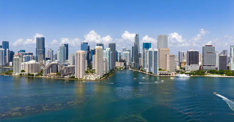 Naklejka premium Miami Brickell skyline with skyscrapers and coastline. Miami aerial cityscape with skyline. Miami coastal skyline with oceanfront. Miami business district skyline view.