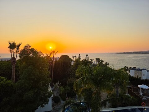 Golden sunset over the Mediterranean Sea in Paphos, Cyprus