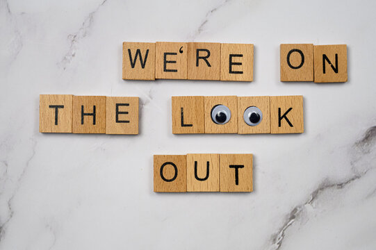 We're on the look out sign