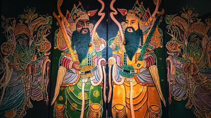 Obraz premium Traditional Painted Door Gods Entrance at San Duo Temple in Melaka Malaysia
