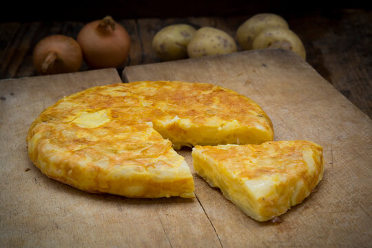 Potato tortilla on wooden board