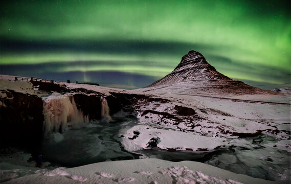 Iceland, frozen Kirkjufell and northen lights