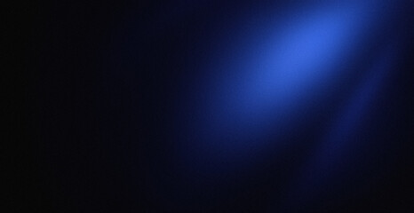 Fototapeta premium Abstract dark blue light beam glowing in the darkness with a soft grainy texture