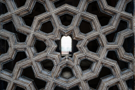 Geometric stone jali screen detail at Humayun Tomb in Delhi