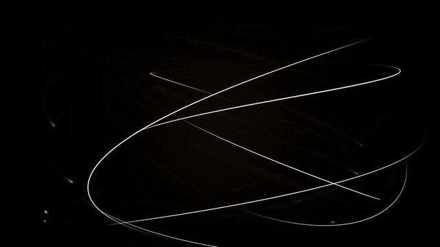 Abstract light trails on black background motion video