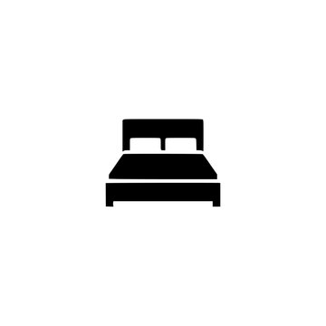 Hotel bed icon. Solid black glyph of a bed for hotel accommodation and travel.