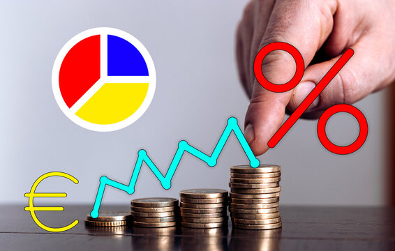 Rising interest rates and investment growth represented with coins and charts symbols