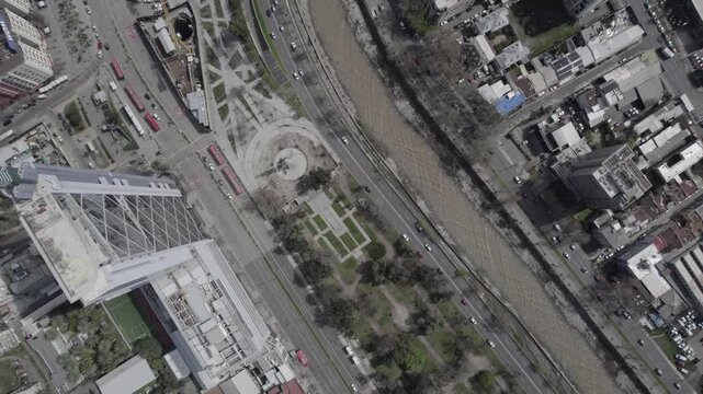 Vertical Aerial View Moving Forward Over Santiago Cityscape and Mapocho River
