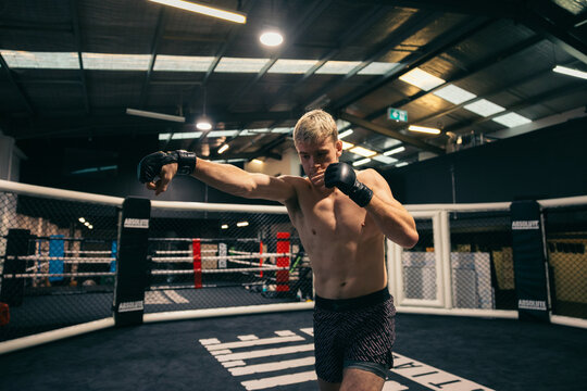 Shadow boxing in MMA cage