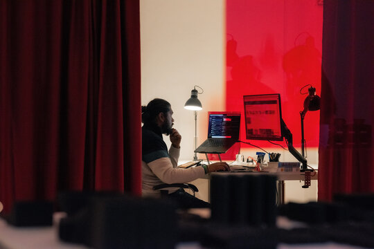 Man working on computer at creative studio