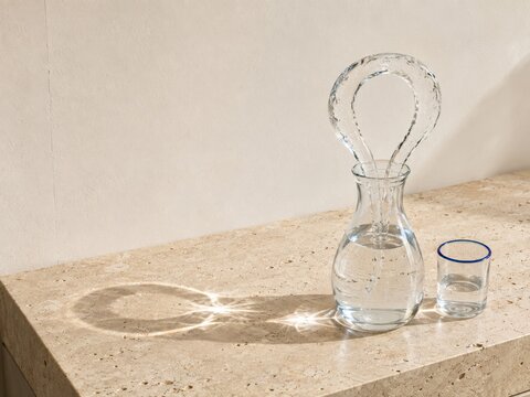 Clear Water Carafe Creates An Impossible Glass Loop for Web Design