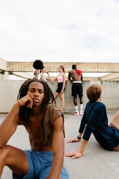 Sports club members relaxing after morning practice
