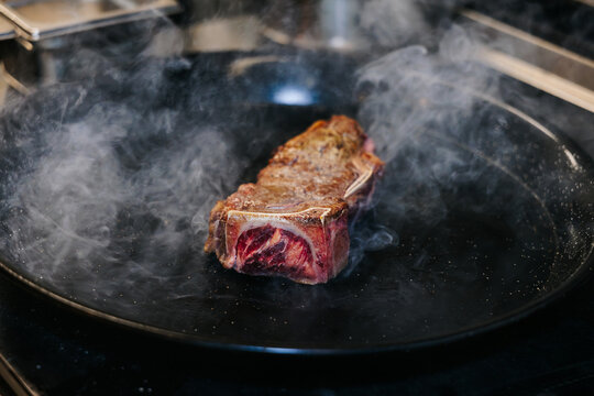 Steak searing in hot pan