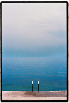 Ocean view with submerged ladder