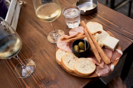 Classical Aperitivo a Table With Food and Drinks at a Local Spot