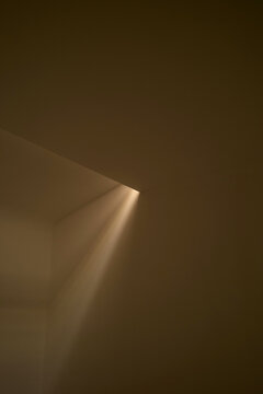 Light Coming Through a Corner in a Dim Room During the Day