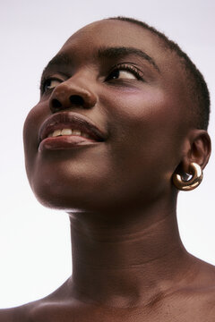 Model Poses With a Confident Expression During a Fashion Shoot