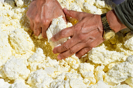 Close-up of Person Making Fresh Traditional Cheese