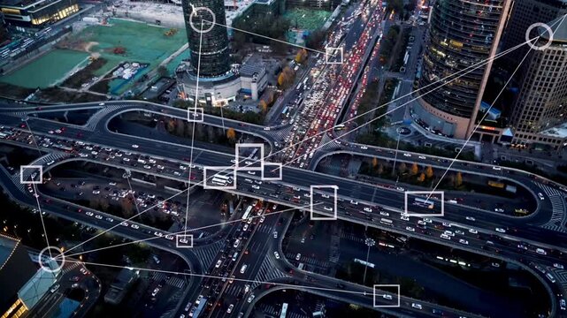 Smart city with 5g communication technology concept with aerial view of urban road network and vehicles driving along traffic at night.