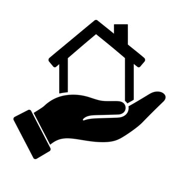 Hand holding tiny house icon represents real estate, home ownership, or property investment opportunities.