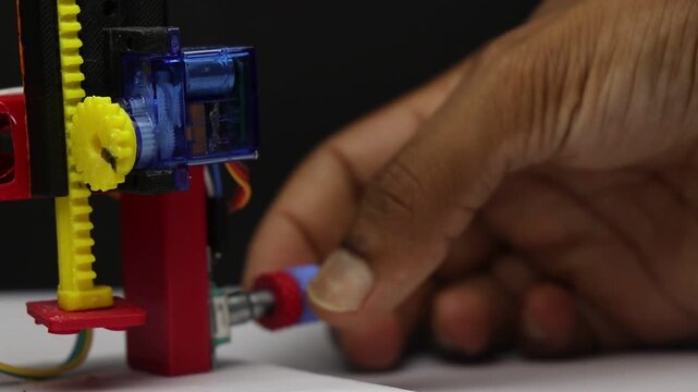 Servo motor with plastic gears controlled by rotary encoder. Working prototype of diy electronics project