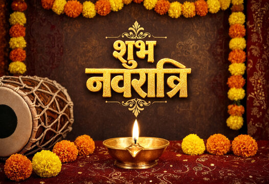 Traditional Indian Navratri festival celebration with diya lamp marigold flowers and dhol drum