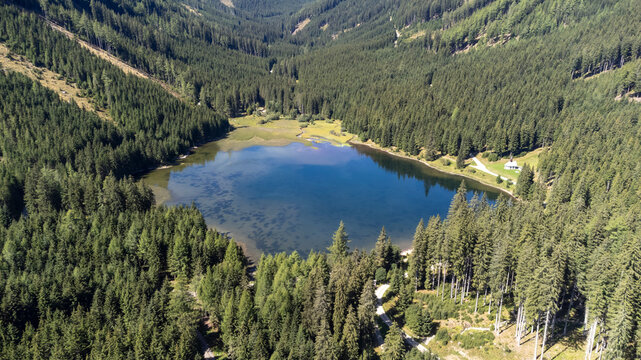 
aerial view of lake Ingeringsee in the Seckau Tauern ( Seckau Alps ) in Styria, Austria