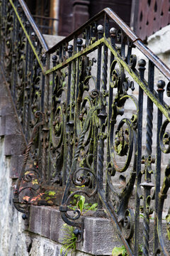 old rugged metal stair railing close up