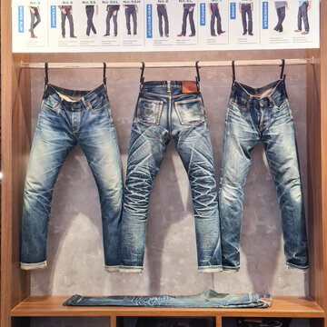 Piger Works Premium Denim Jeans Collection Hanging On Display Rack In Retail Store Editorial Illustrative on August 27, 2026 in Bangkok, Thailand 