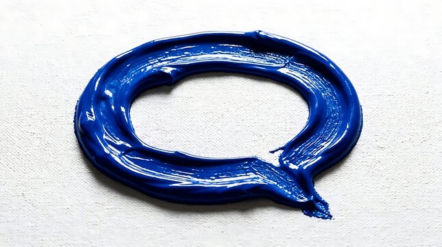 Thick impasto blue paint stroke forming circular speech bubble on white canvas for artistic messaging and creative icons