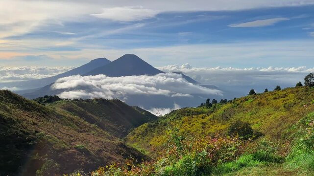 Stunning Video of Sea of Clouds and Rolling Green Hills at Mount Prau Indonesia
