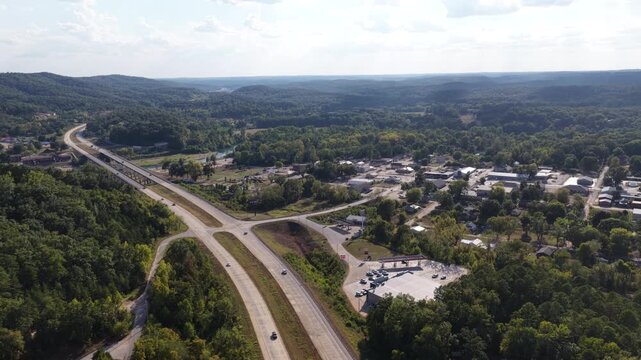 Aerial of small town intersection and highway in Van Buren Missouri