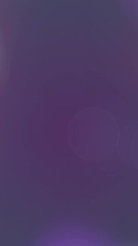 Animation of moving glowing lights over dark background