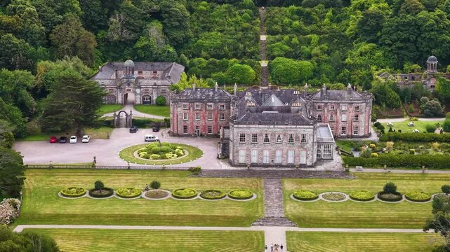 Aerial footage of Bantry House and gardens in County Cork, Ireland. Historic Bantry House, manor home surrounded by beautifully manicured gardens, trees and terraced lawns in County Cork, Ireland. 