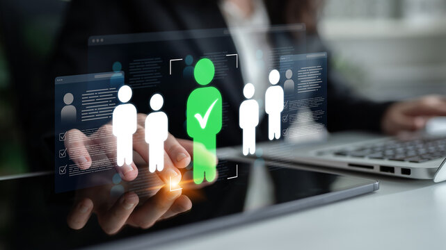 This image illustrates a modern recruitment process, where a professional uses technology to select a candidate, emphasizing the integration of human resources and innovation in hiring. Nascent