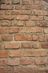 Obraz premium Ściana z czerwonej cegły - różne odcienie czerwieni. Red brick wall - different shades of red. 