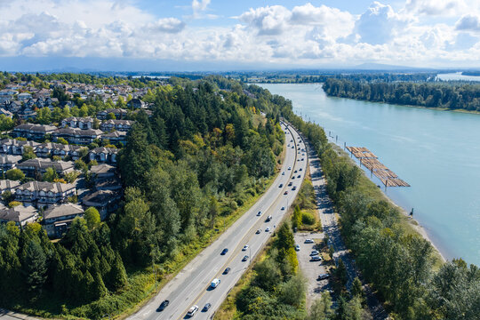 Aerial View of Suburban Port Coquitlam Riverfront Highway and Residential Neighborhood Near Vancouver