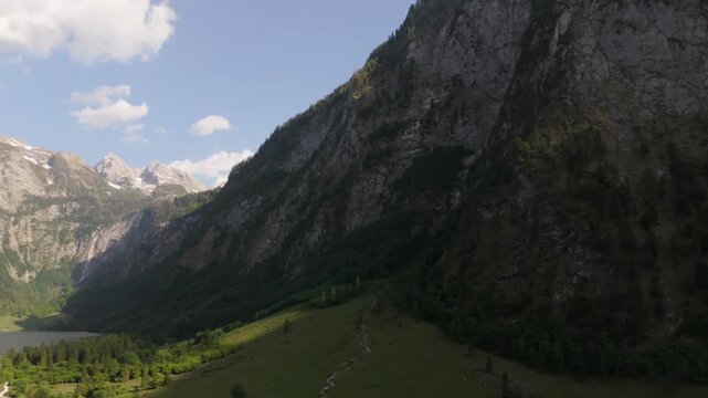 Obersee Cliff Face Aerial Pan Berchtesgaden Bavaria Germany